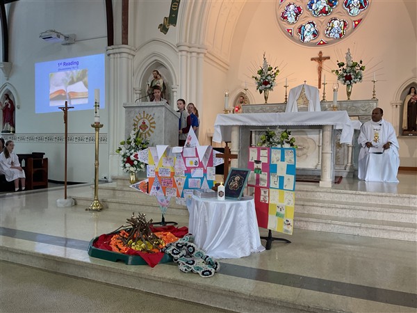 inside a church for a school mass